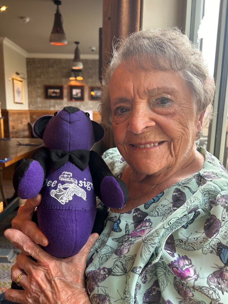 Chester Bear with retired director Anne Hesketh