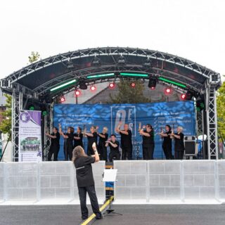 https://deesignchoir.co.uk/wp-content/uploads/2025/10/Dee-Sign-Choir-at-Mold-Food-and-Drink-Festival-2025.jpg