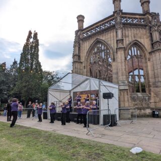 https://deesignchoir.co.uk/wp-content/uploads/2025/10/Dee-Sign-Choir-at-the-Bombed-Out-Church-in-Liverpool.jpg